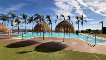 Apartamento con terraza y espectaculares vistas al mar en Mijas Costa photo 0