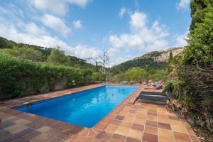 Finca rústica con vistas a la Serra de Tramuntana y piscina en Puigpunyent photo 0