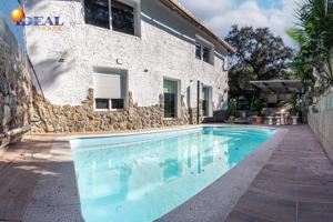 ESPECTACULAR CASA CON TERRENO EN LA SIERRA SUR photo 0