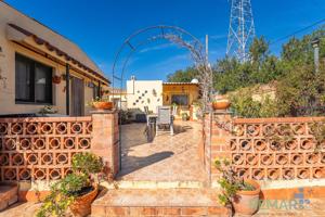 EXCLUSIVA CASA CON TERRENO EN MONTBRIO DEL CAMP photo 0