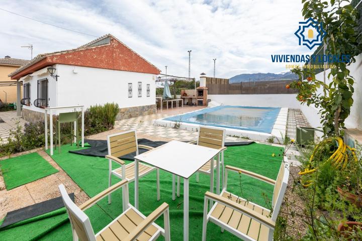 Chalet de una planta en Otura con jardín, piscina y terraza photo 0