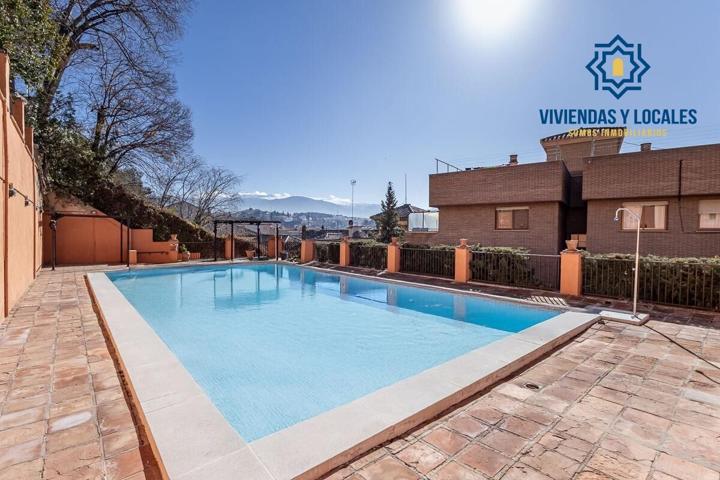 EXCLUSIVO PISO CON JARDÍN PRIVATIVO EN UNA DE LAS MEJORES URBANIZACIONES DE GRANADA photo 0