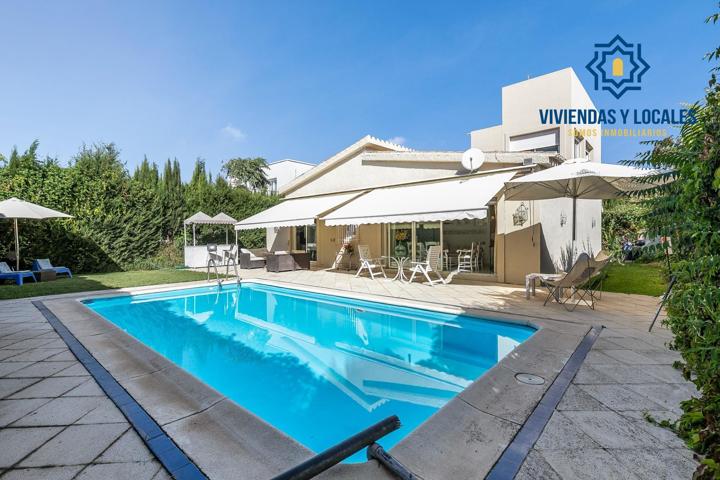 CHALET CON PARCELA Y PISCINA EN URBANIZACIÓN LOS CHOPOS. photo 0