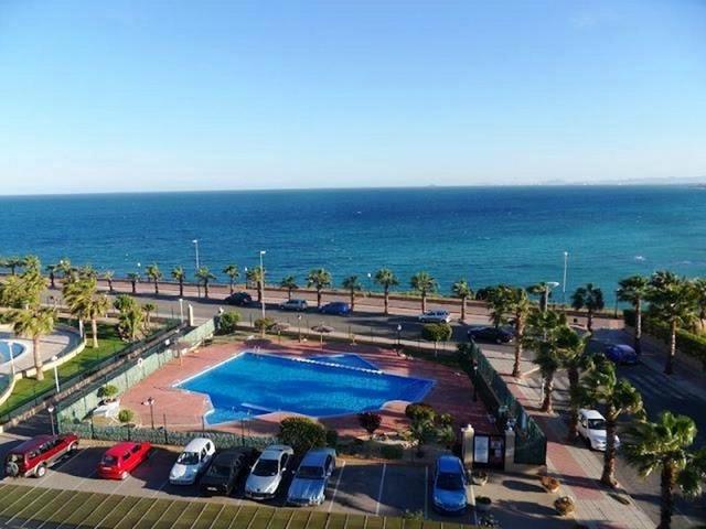 Apartamento en primera línea de mar en complejo con piscina y plaza de parking!!! photo 0