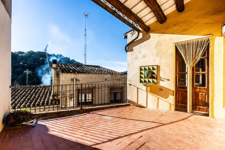 CASA REFORMADA RÚSTICA, EN EL CENTRO DE SANT LLORENÇ SAVALL photo 0