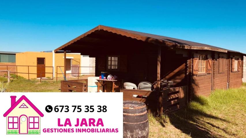 PARCELA EN CHIPIONA CON CASA DE MADERA PARA REFORMAR photo 0