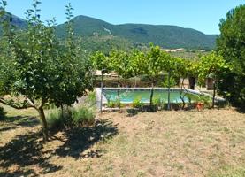 Parcela urbana-rústica de 2.000 m² en Belascoáin con vistas impresionantes y piscina – Ideal para construir tu casa soñada photo 0