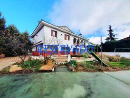 Chalet unifamiliar en venta en Moraleja de Enmedio photo 0