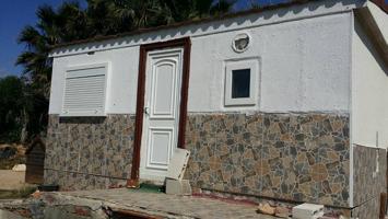 Gran parcela con una casita la cual se puede ampliar photo 0