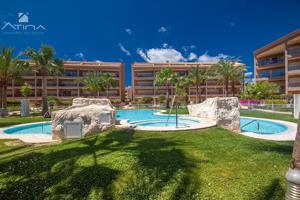 Apartamento en planta baja con acceso directo al jardín y piscina , en la Playa del Arenal, Javea. photo 0