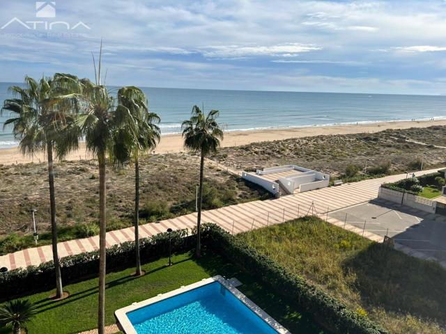 Espectacular apartamento en primera línea de playa en Daimús, con inmejorables vistas frontales al m photo 0