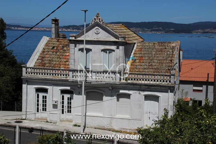 Casa a reformar en la playa Bueu photo 0