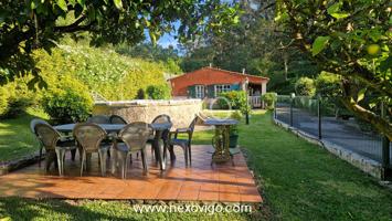 Casa de planta baja con jardín y piscina en Aldán photo 0