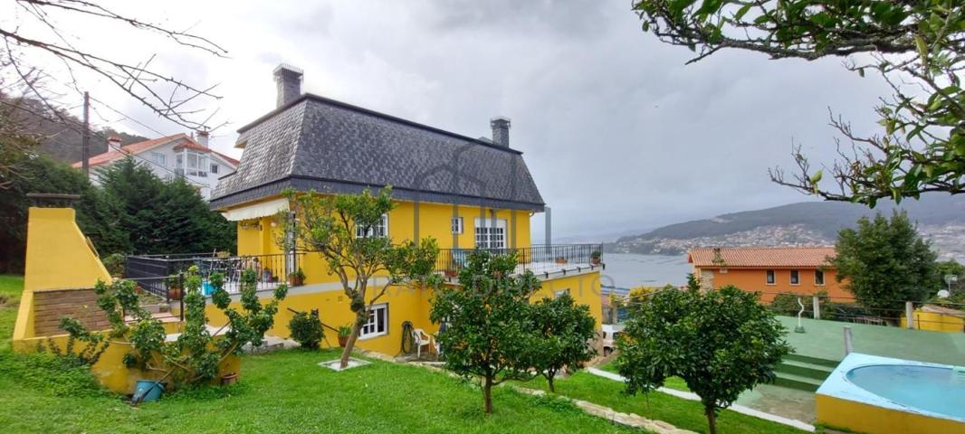 Vivienda familiar con 1533m2 de parcela y bonitas vistas a la Ría de Vigo photo 0