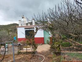 Casa con terreno en venta en Yunquera photo 0