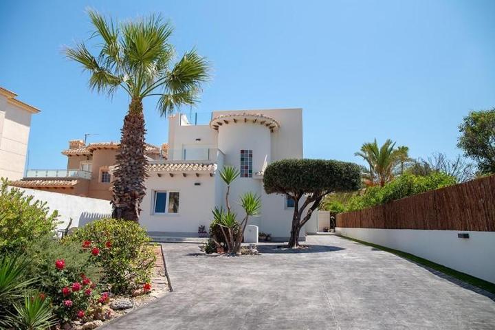 Chalet en venta en Orihuela Costa, Playa Flamenca photo 0