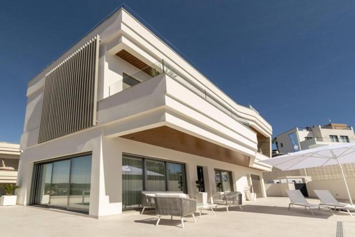 Adosada en venta en Orihuela Costa, Campoamor photo 0
