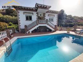 Casa con terreno en venta en Nerja photo 0