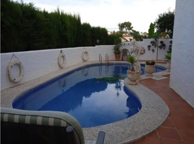 Chalet en venta en Nerja, Calle Bajamar, 29780 photo 0