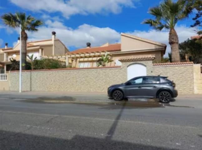 Casa en venta en Puerto de Mazarrón, Playa Grande photo 0