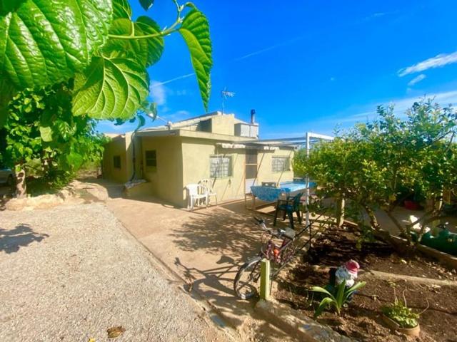Casa con terreno en venta en Masdenverge, Barranc fondo photo 0