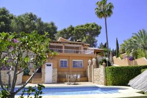 Chalet en venta en Denia, Playa de Las Rotas photo 0