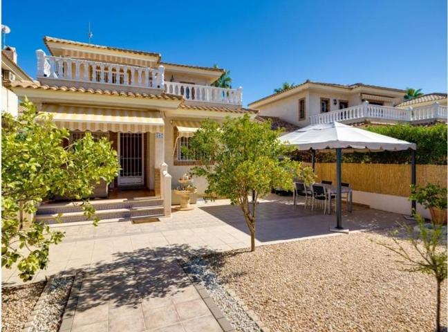 Adosada en venta en Orihuela Costa, Playa Flamenca photo 0