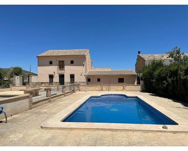 Casa con terreno en venta en Raspay photo 0