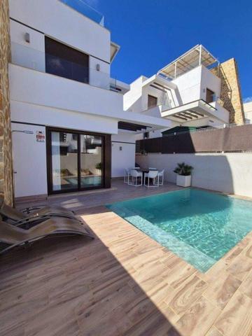 Adosada en venta en Villamartin photo 0