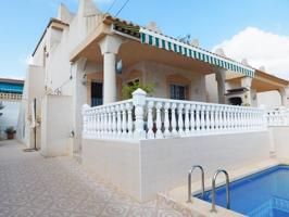 Chalet en venta en San Miguel de Salinas, Urbanizacion blue lagoon photo 0