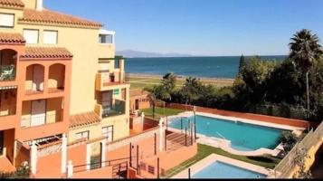 Apartamento en venta en Manilva, 1ª linea de playa photo 0