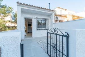 Adosada en venta en Orihuela Costa photo 0