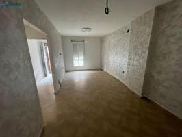 Adosada en venta en Brenes, Andalucia photo 0