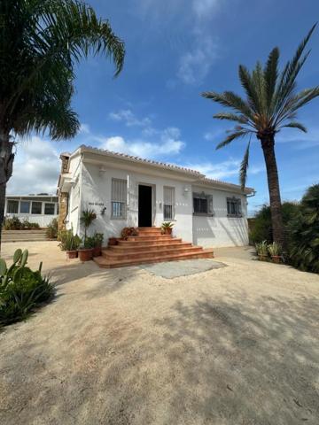 Casa con terreno en venta en Denia, Las Marinas (Almadrava) photo 0
