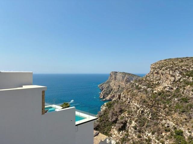 Chalet en venta en Benitachell, Palmeras photo 0