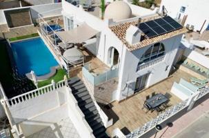 Chalet en venta en San Miguel de Salinas, Urbanizacion blue lagoon photo 0