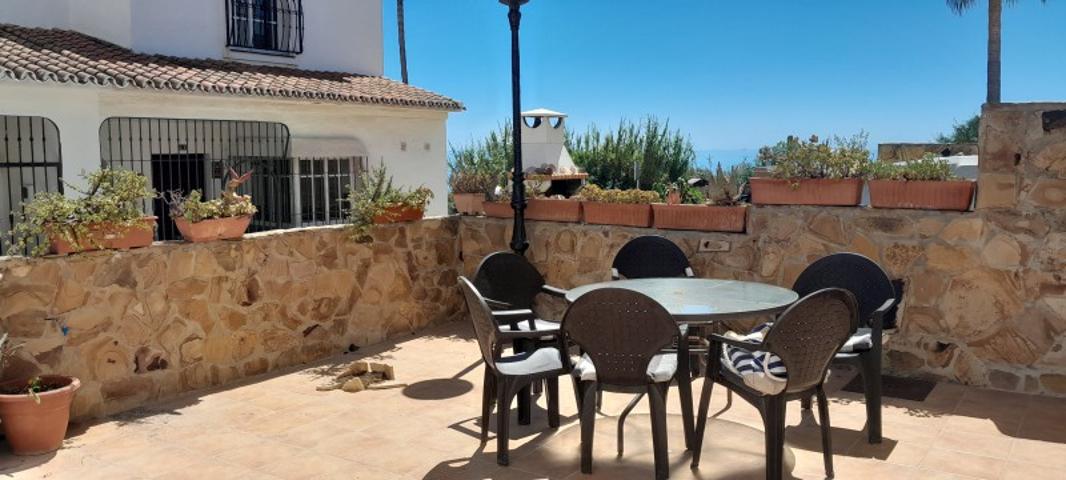 Adosada en venta en Manilva photo 0