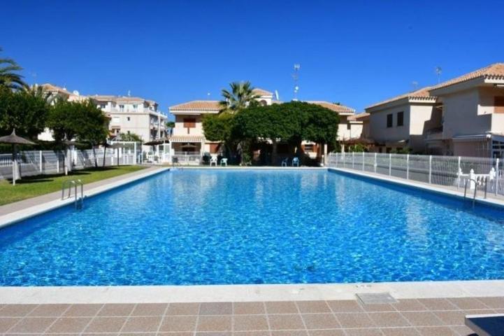 Adosada en venta en Orihuela Costa, Playa Flamenca photo 0