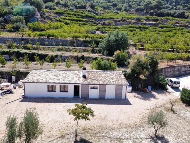 Casa con terreno en venta en Vall de Gallinera photo 0