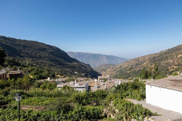 Adosada en venta en Bubión, Bubion photo 0