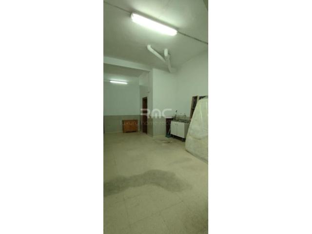 Local comercial en venta en Benetússer photo 0