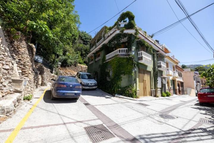 Casa con terreno en venta en Granada, Gran via photo 0