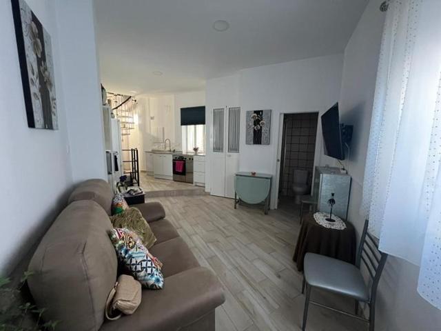 Adosada en venta en Lora del Río, Andalucia photo 0