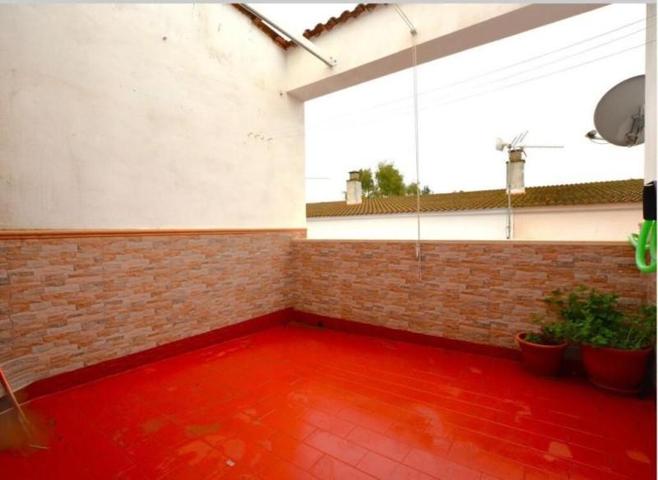 Adosada en venta en Niebla photo 0