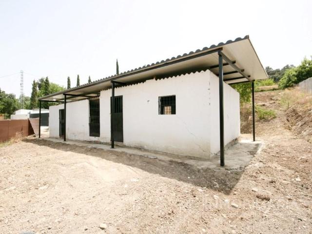 Casa con terreno en venta en Coín photo 0