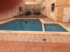 Apartamento en venta en Torrevieja, Playa de los Locos photo 0