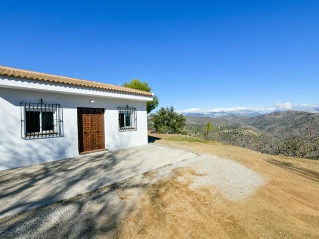 Chalet en venta en Colmenar photo 0