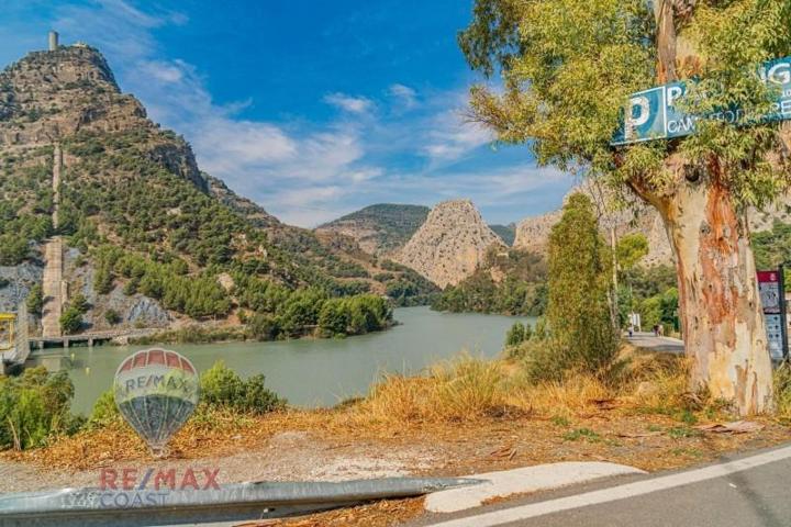 Casa con terreno en venta en Alora, El chorro photo 0