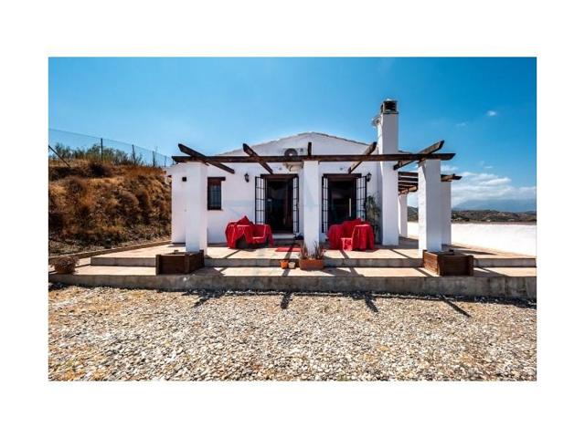 Casa con terreno en venta en Coín photo 0