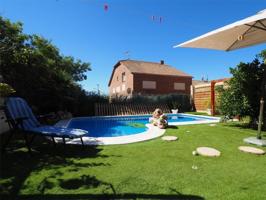 Adosada en venta en Quer photo 0